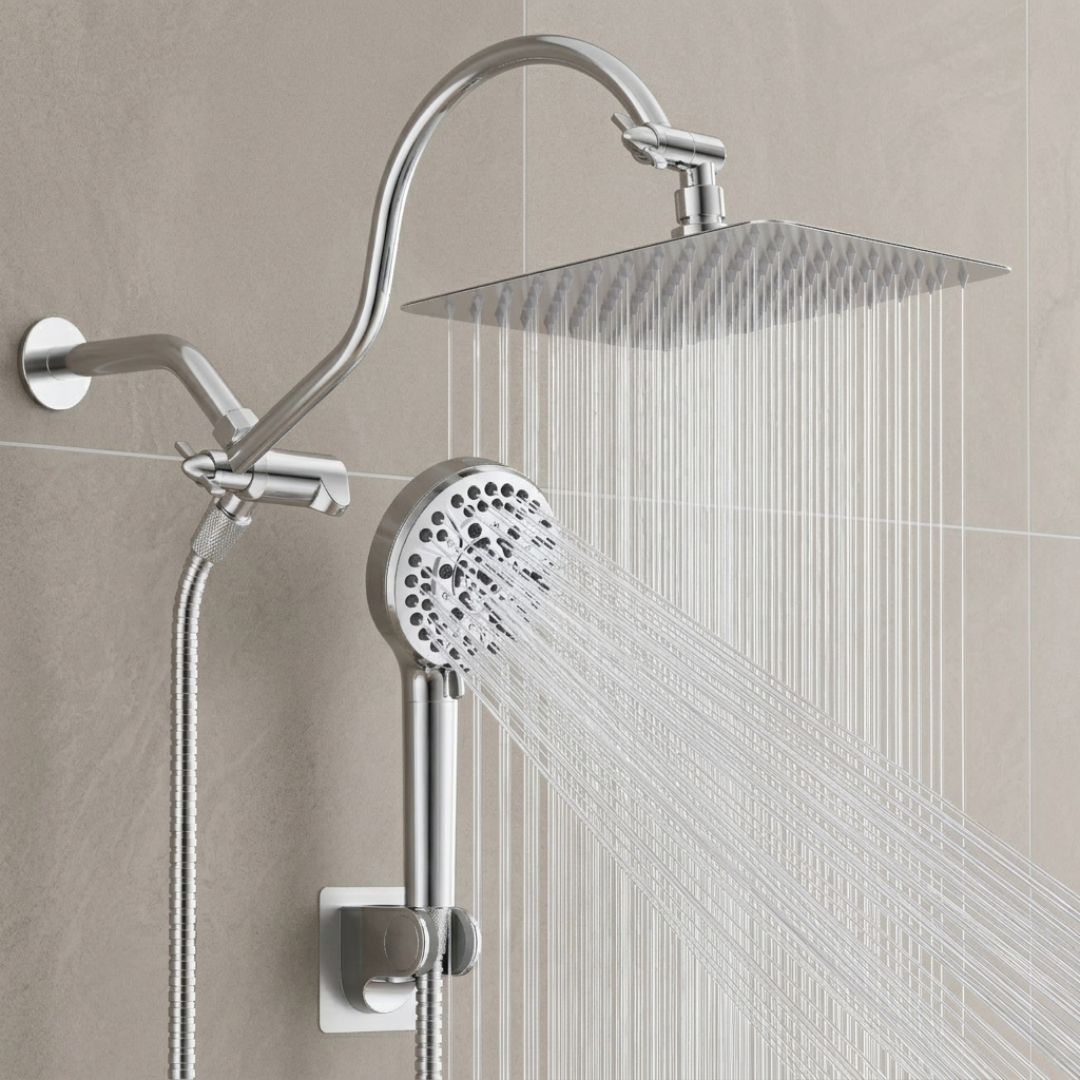 Chrome shower head and handheld shower set against a beige tiled wall.